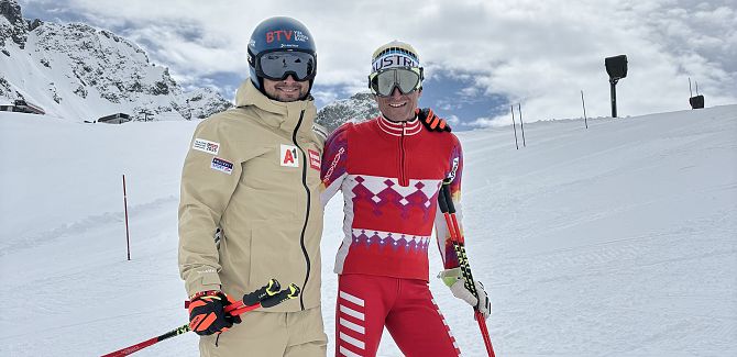 Johannes Strolz poses with his father, Hubert Strolz, during a ski photoshoot.