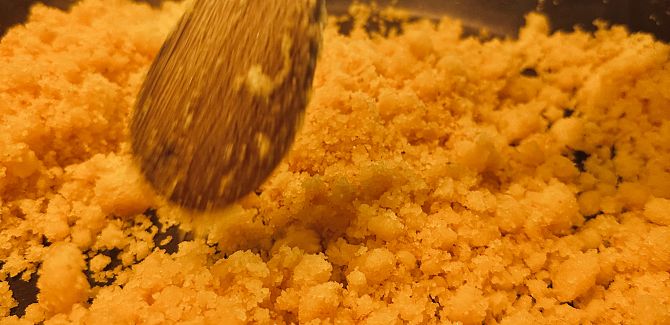 A pan in which the Riebel is slowly becoming more crumbly.