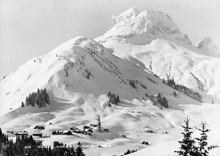 Historic photo of the village of Warth, completely blanketed in snow.