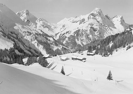 Historic image of Schröcken Nesslegg, completely covered in snow.