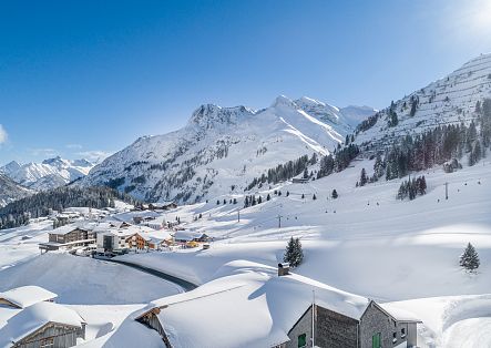 View of the village of Warth, entirely covered in snow.